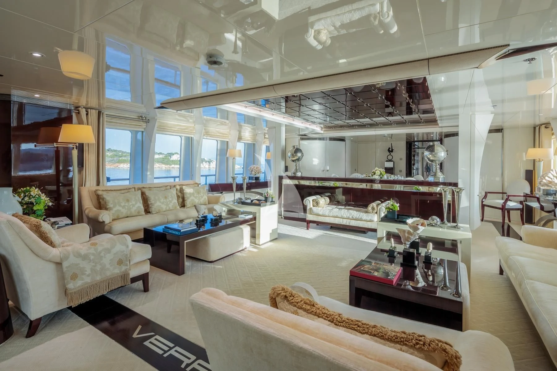 a living room with a large bed aboard VERA Yacht for Sale