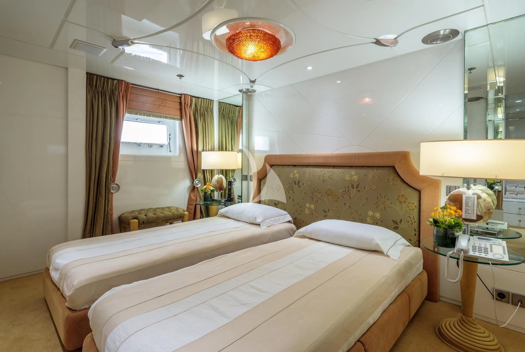 a bedroom with two beds aboard VERA Yacht for Sale