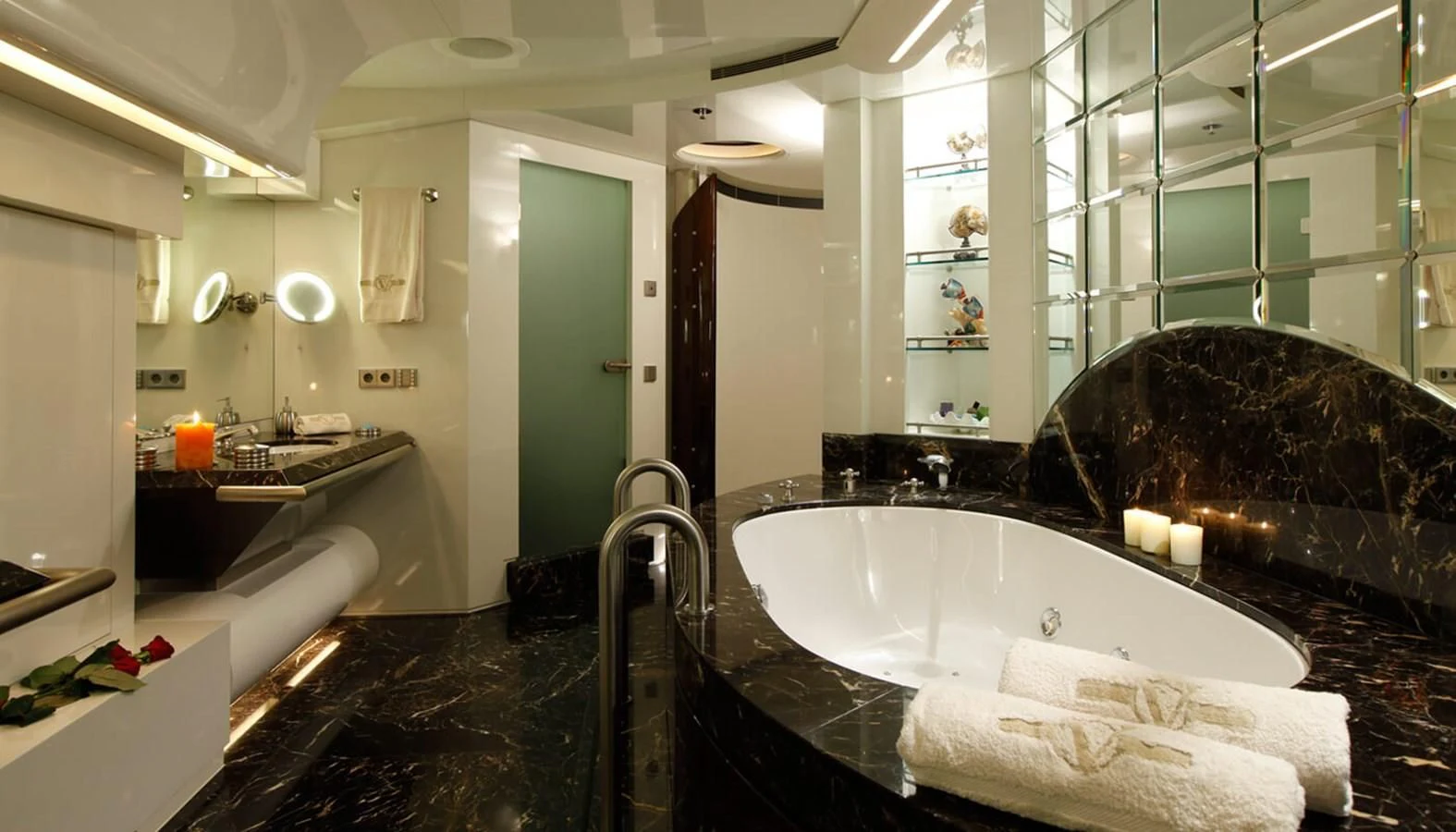a large bathroom with a large bathtub aboard VERA Yacht for Sale