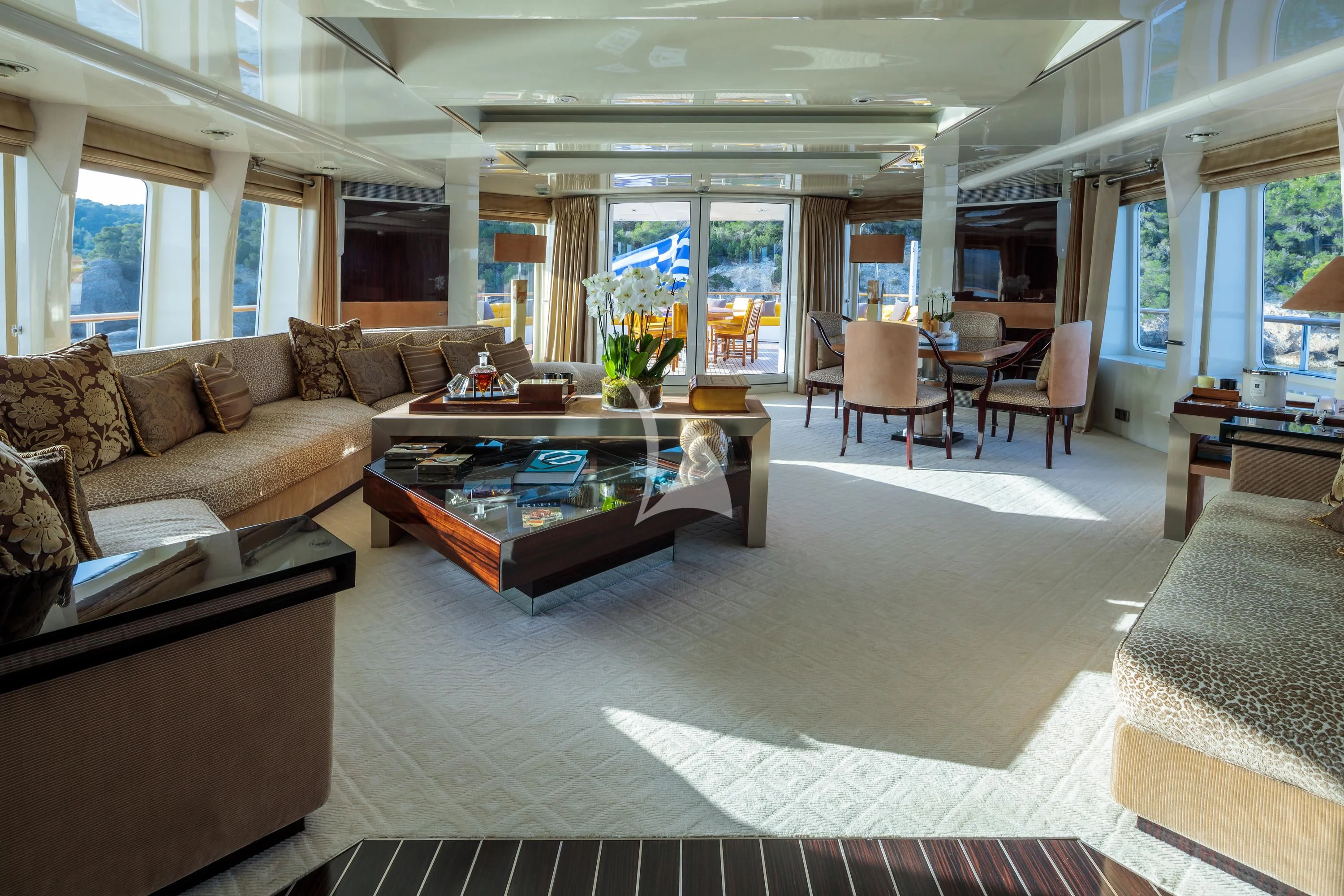 a living room with a large window aboard VERA Yacht for Sale