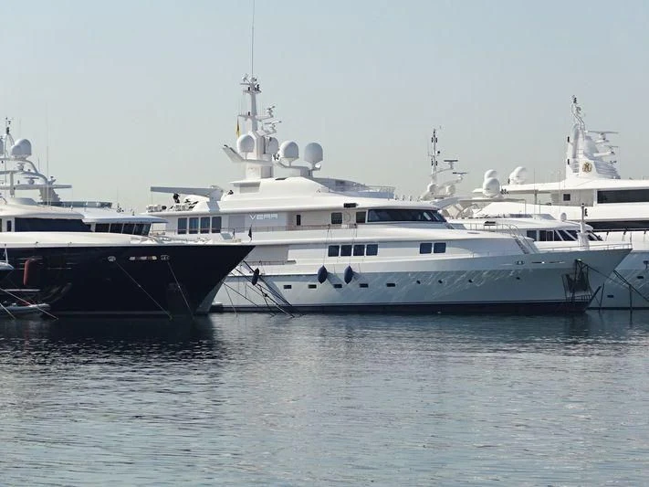 a few large yachts in the water aboard VERA Yacht for Sale