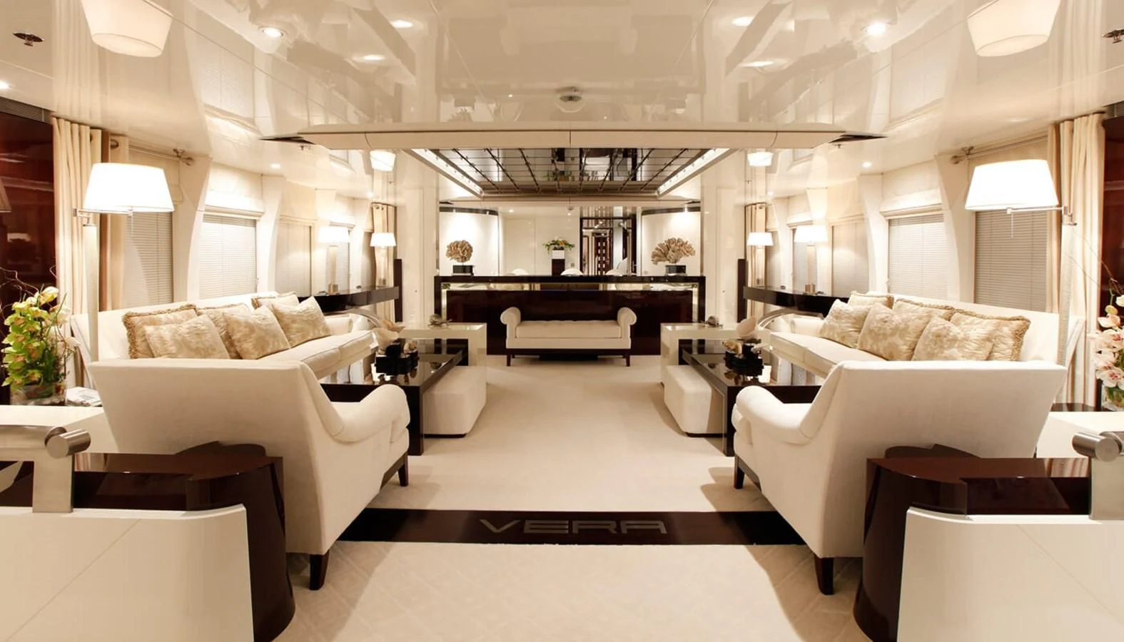 a large living room with a piano aboard VERA Yacht for Sale