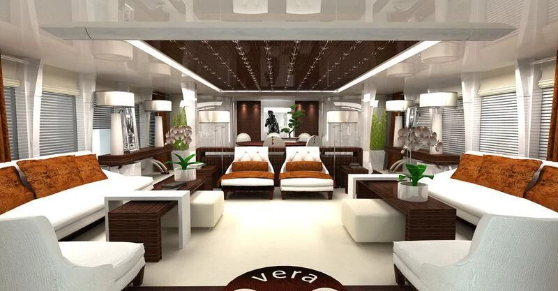 a large room with a couch and a table aboard VERA Yacht for Sale