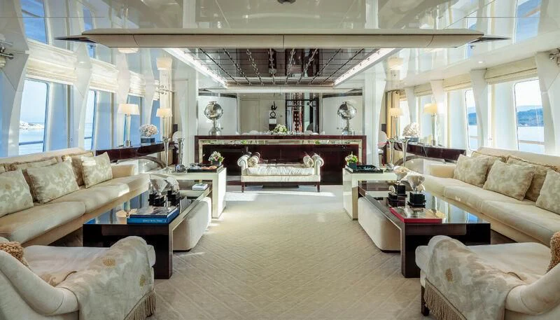 a large living room with a piano aboard VERA Yacht for Sale