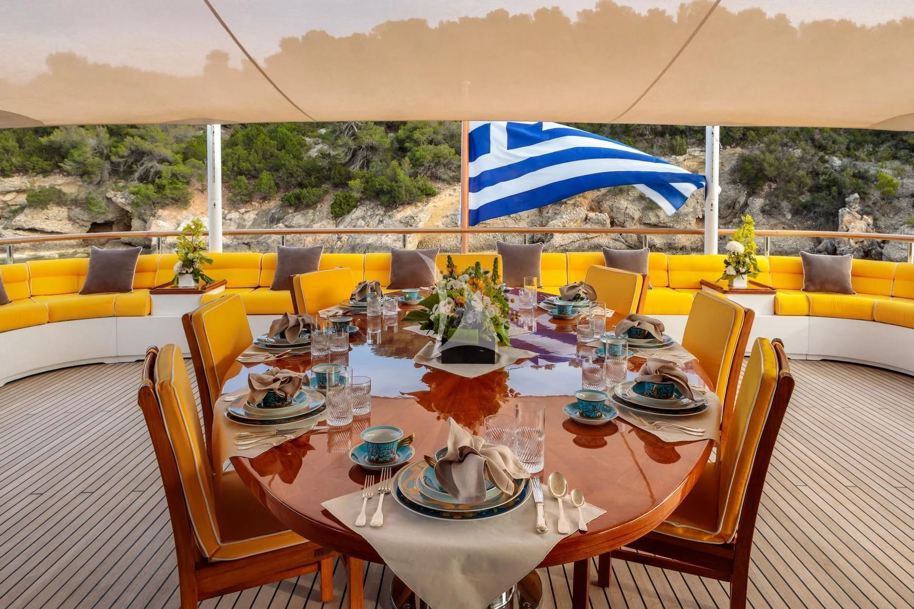 a table set for a meal aboard VERA Yacht for Sale