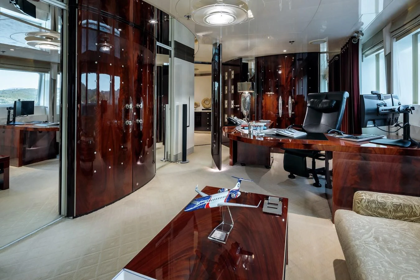 a room with a desk and a chair aboard VERA Yacht for Sale