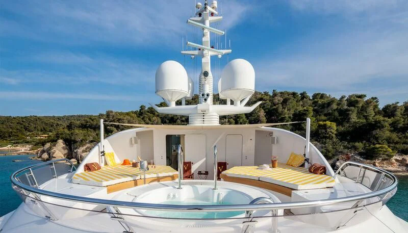 a boat with a satellite dish on top aboard VERA Yacht for Sale