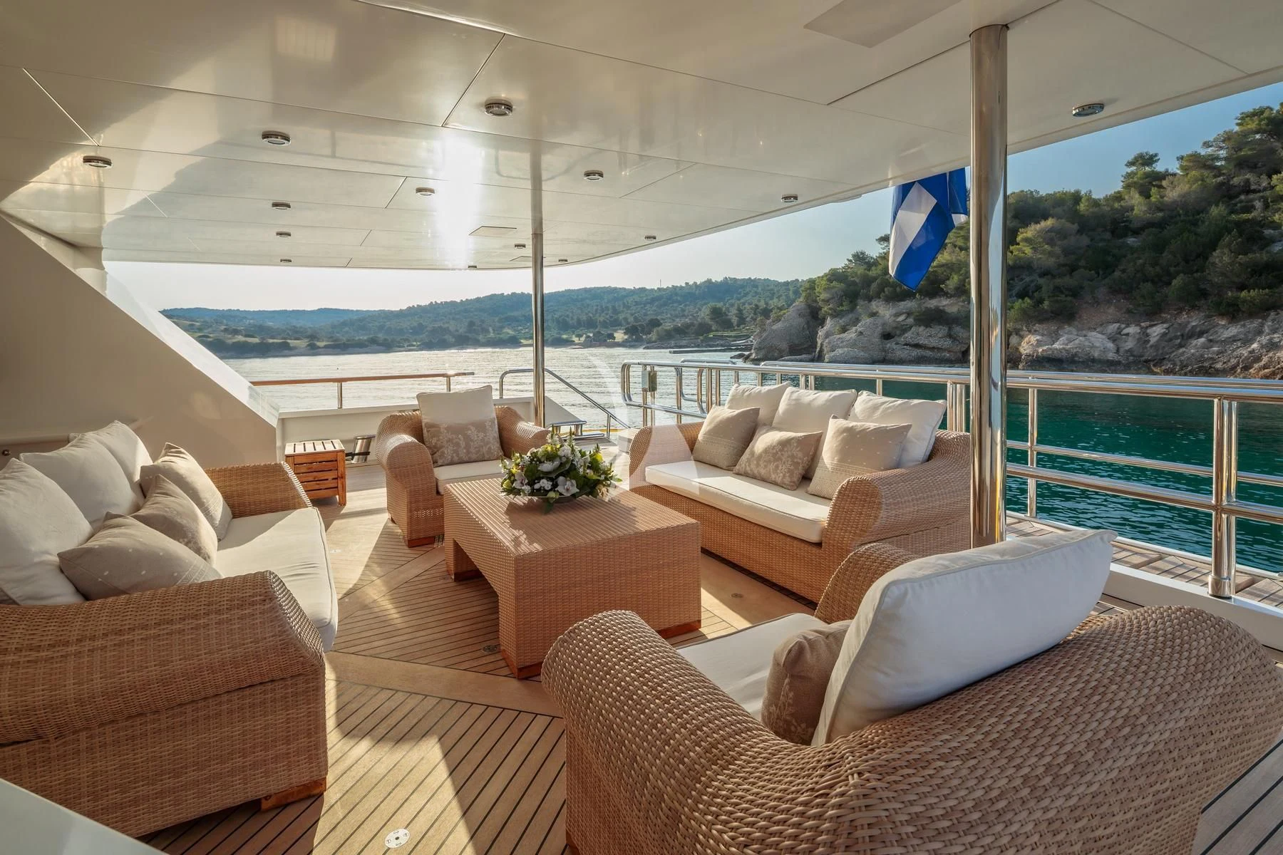 a living room with a large window aboard VERA Yacht for Sale
