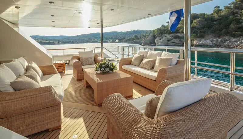 a living room with a large window aboard VERA Yacht for Sale