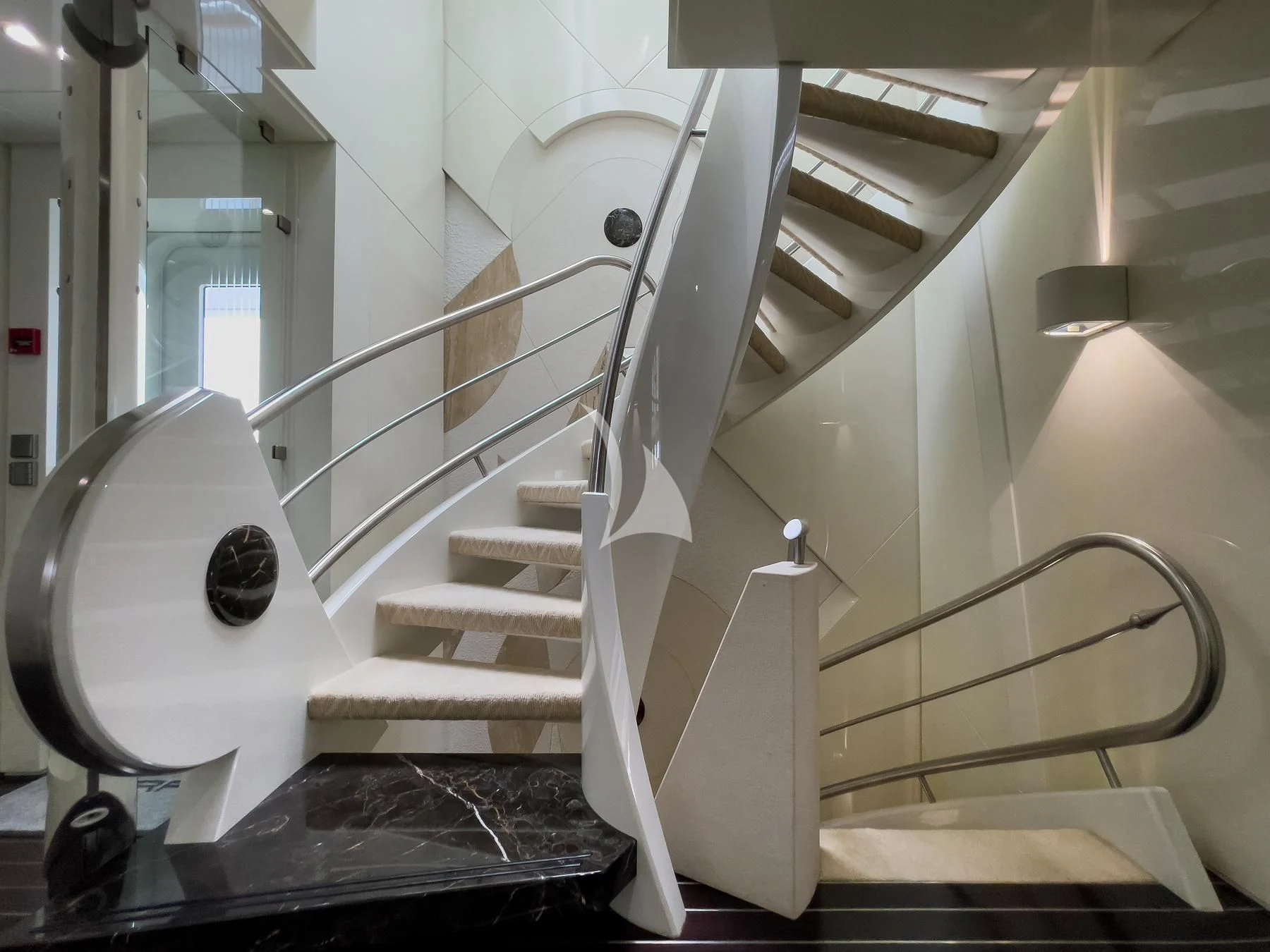 a toilet with a large roll of toilet paper on the side aboard VERA Yacht for Sale
