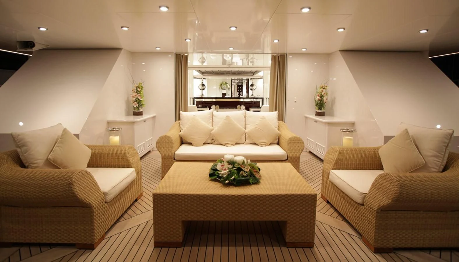 a living room with a couch and a coffee table aboard VERA Yacht for Sale