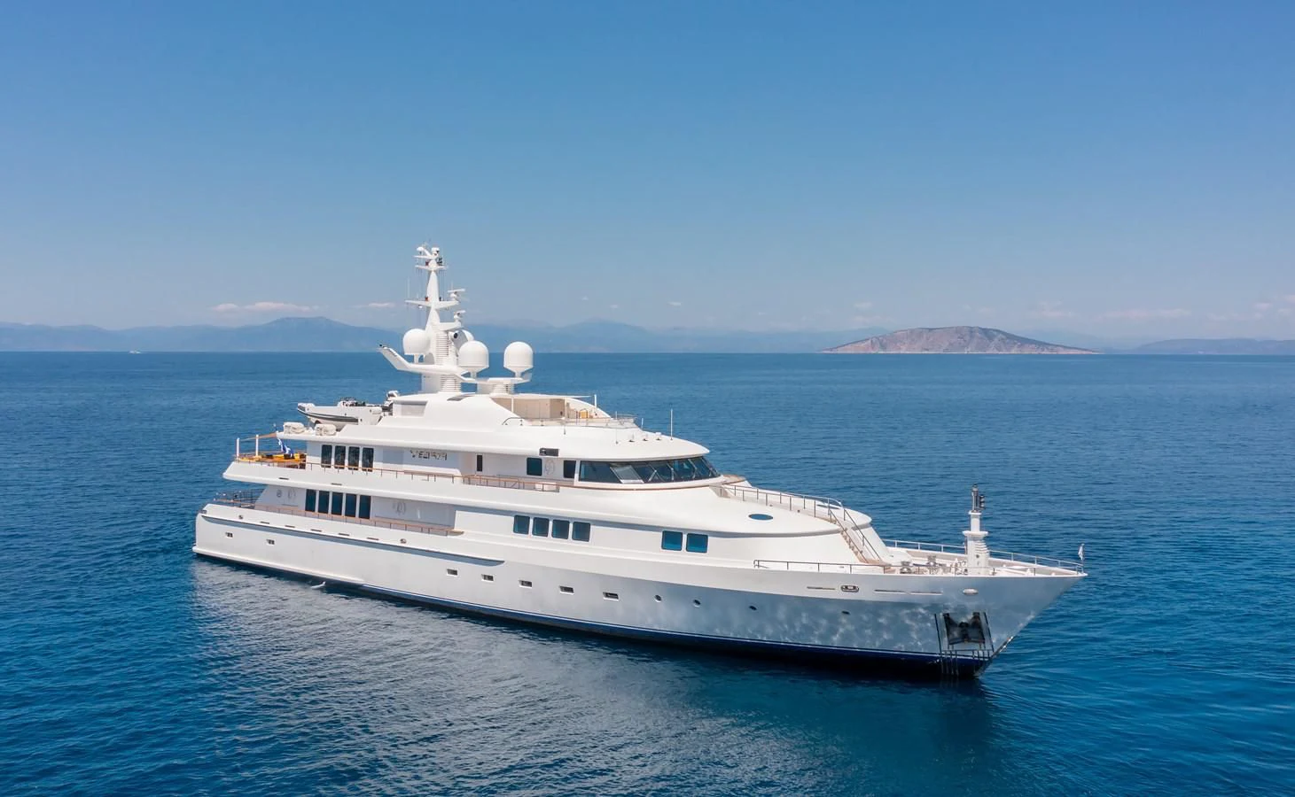 a large white boat in the water aboard VERA Yacht for Sale
