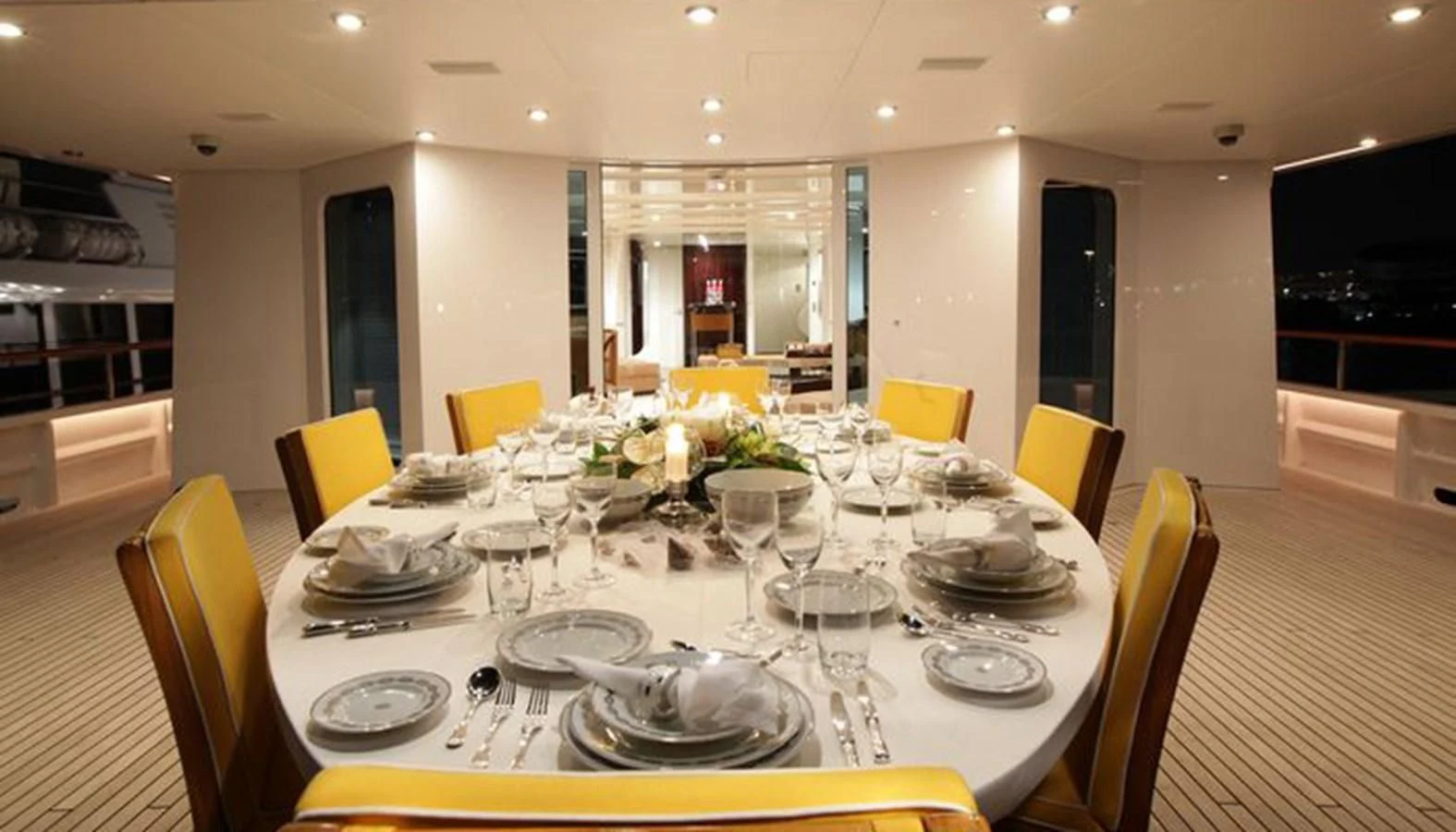 a table set for a dinner aboard VERA Yacht for Sale