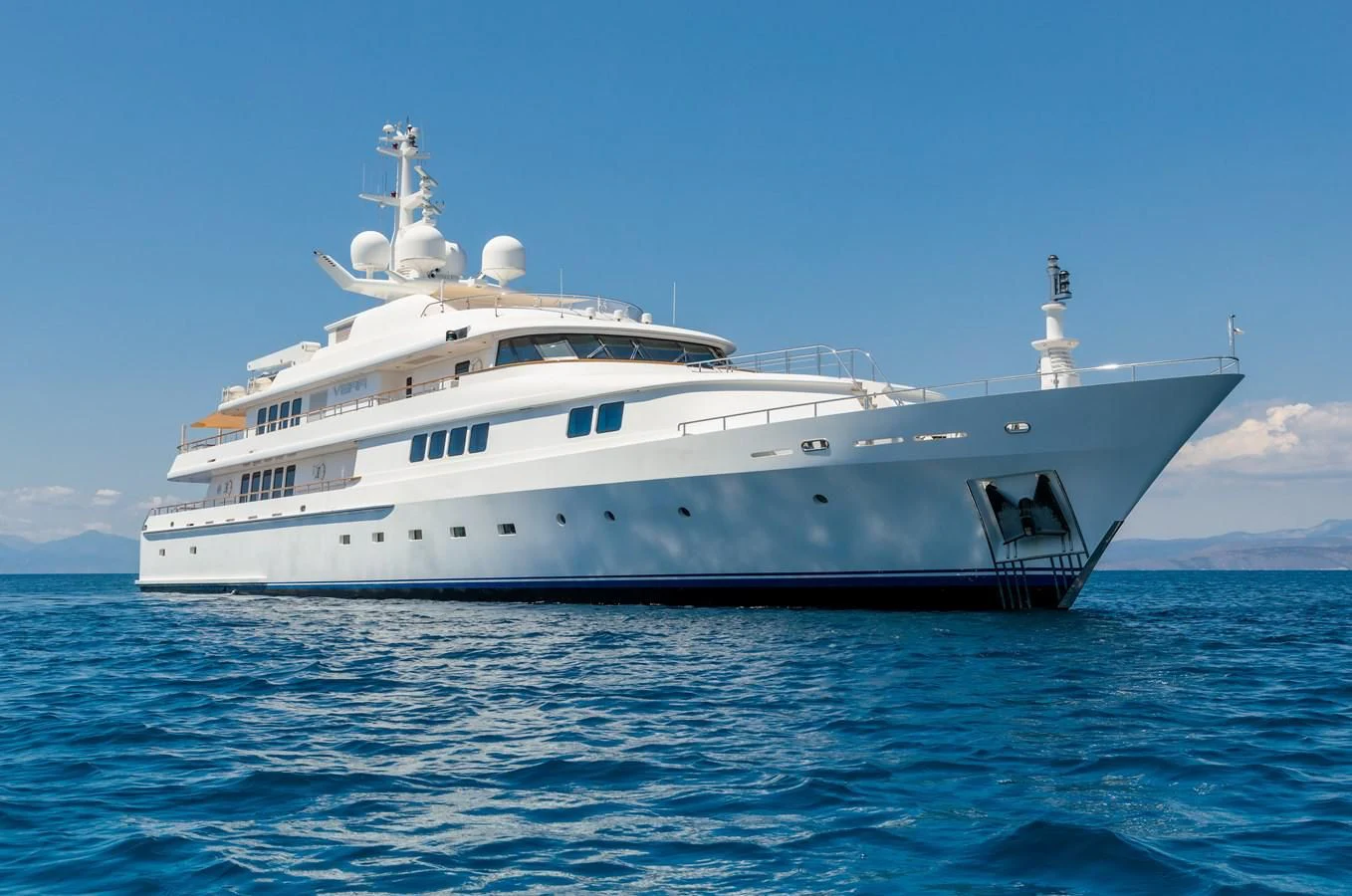 a large white ship in the water aboard VERA Yacht for Sale