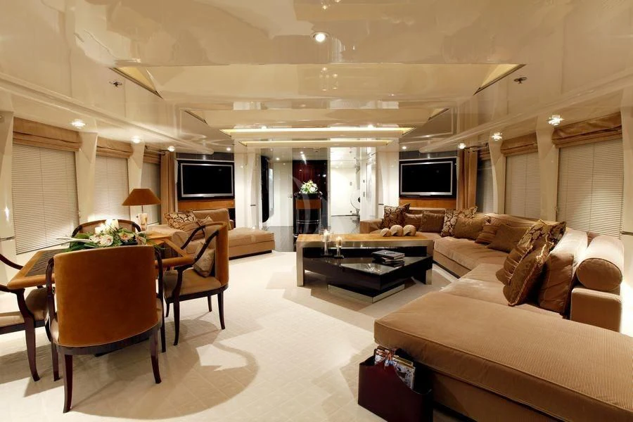 a living room with a couch and a table aboard VERA Yacht for Sale