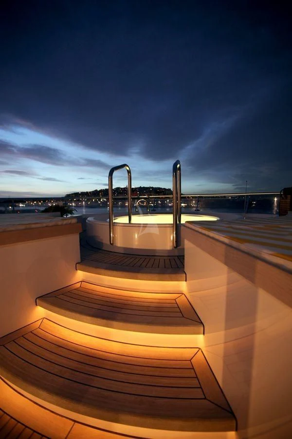 a large metal faucet on a balcony aboard VERA Yacht for Sale