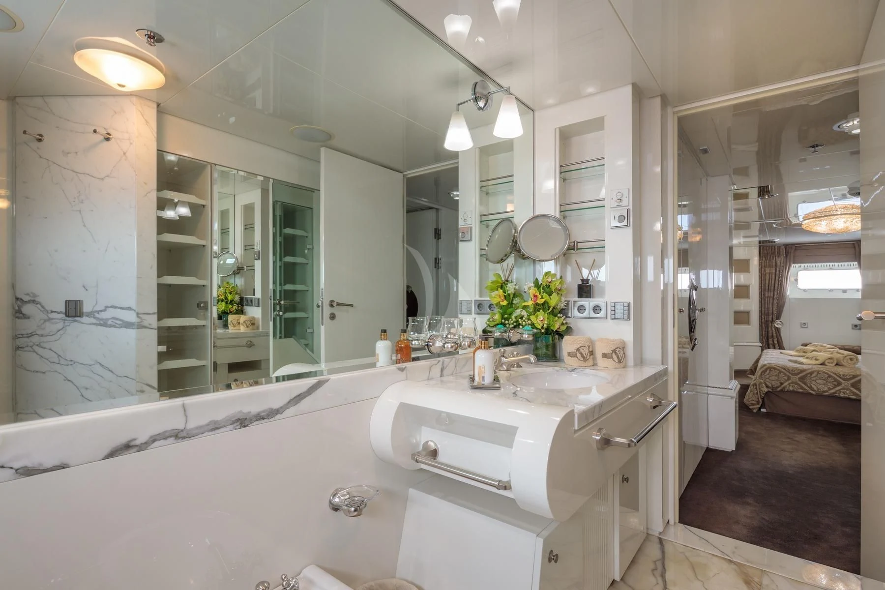 a bathroom with a large mirror aboard VERA Yacht for Sale