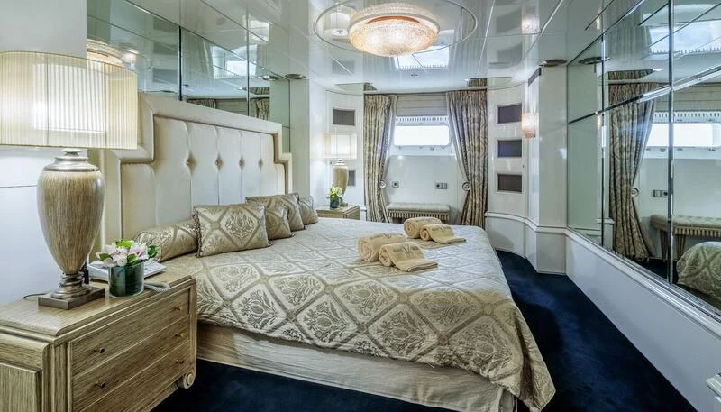 a bed in a room aboard VERA Yacht for Sale