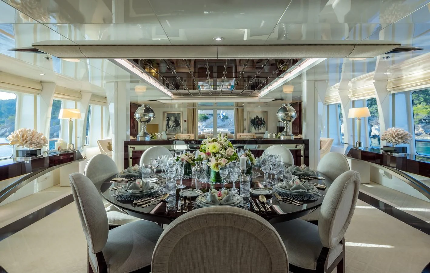 a dining room with a large table aboard VERA Yacht for Sale