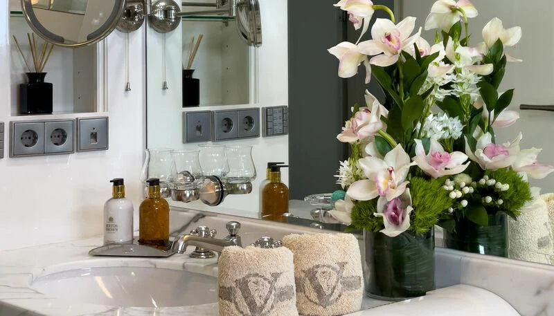 a sink with flowers aboard VERA Yacht for Sale