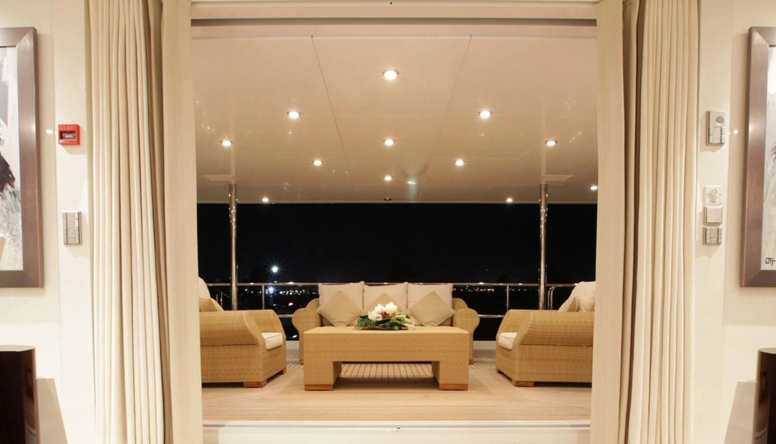 a living room with a large screen aboard VERA Yacht for Sale