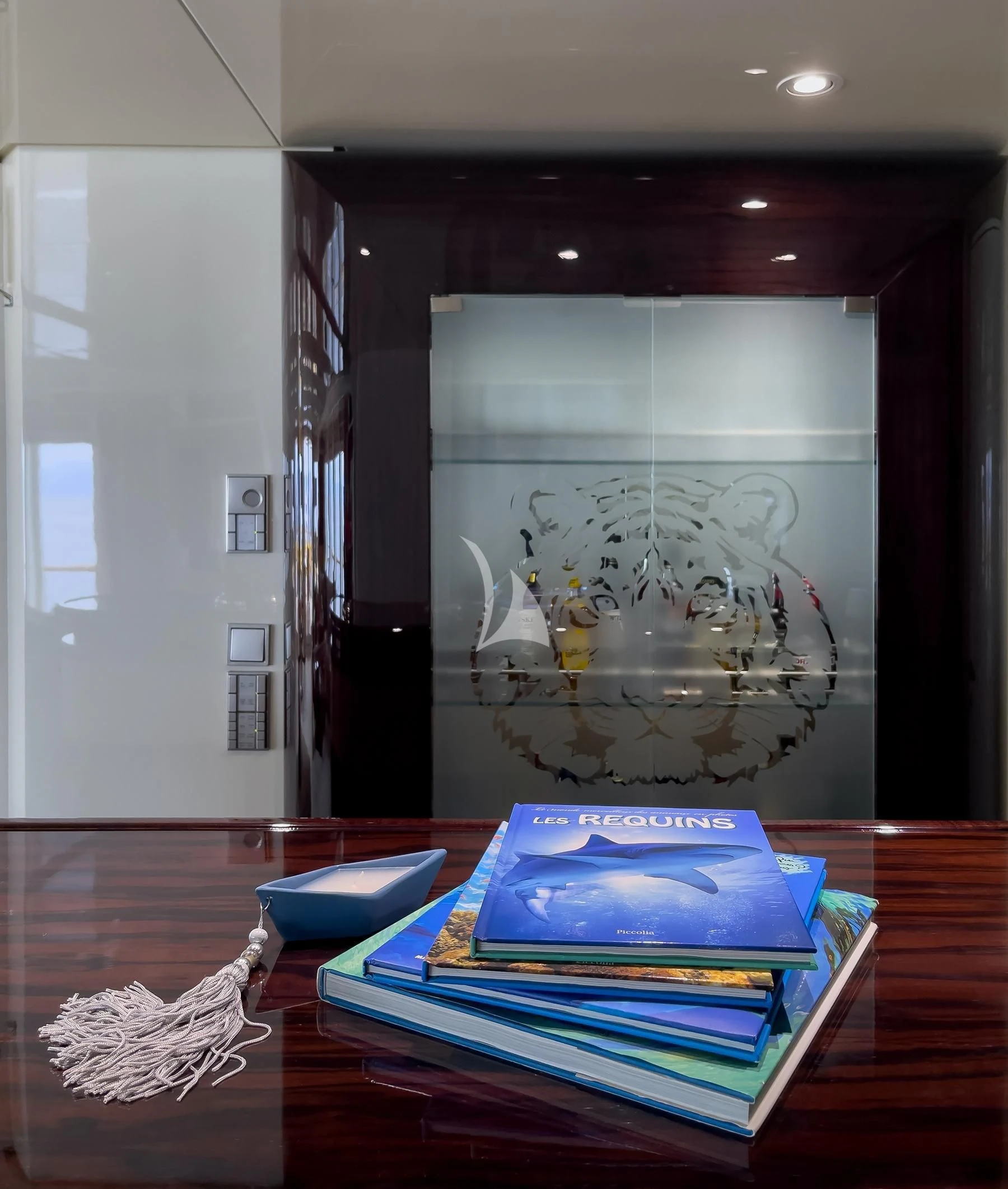 a book on a table aboard VERA Yacht for Sale