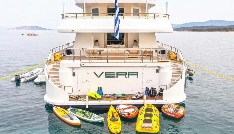 a boat with a flag on it aboard VERA Yacht for Sale