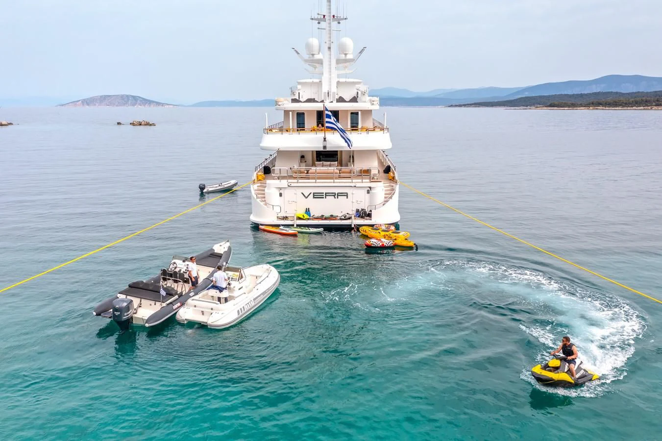 a boat and a boat in the water aboard VERA Yacht for Sale