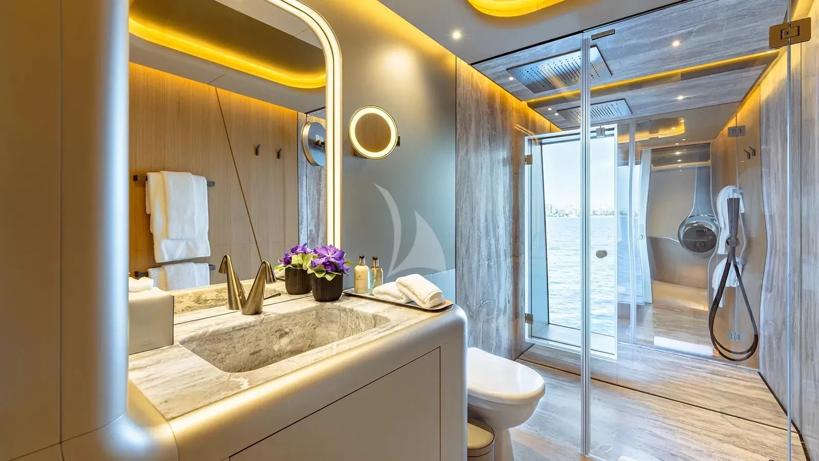 a bathroom with a large glass shower aboard THIS IS IT I Yacht for Sale