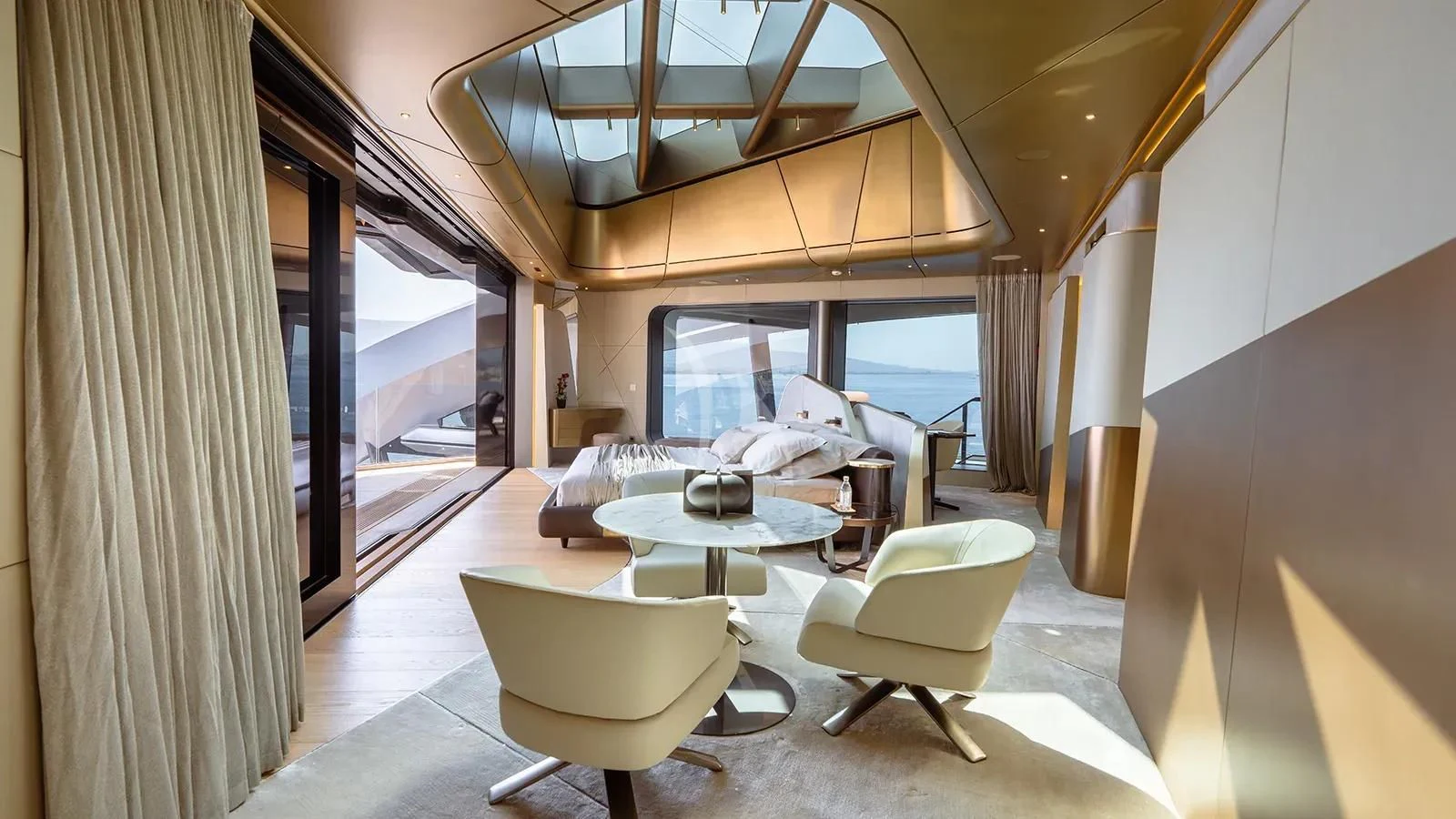 a room with a table chairs and a large window aboard THIS IS IT I Yacht for Sale