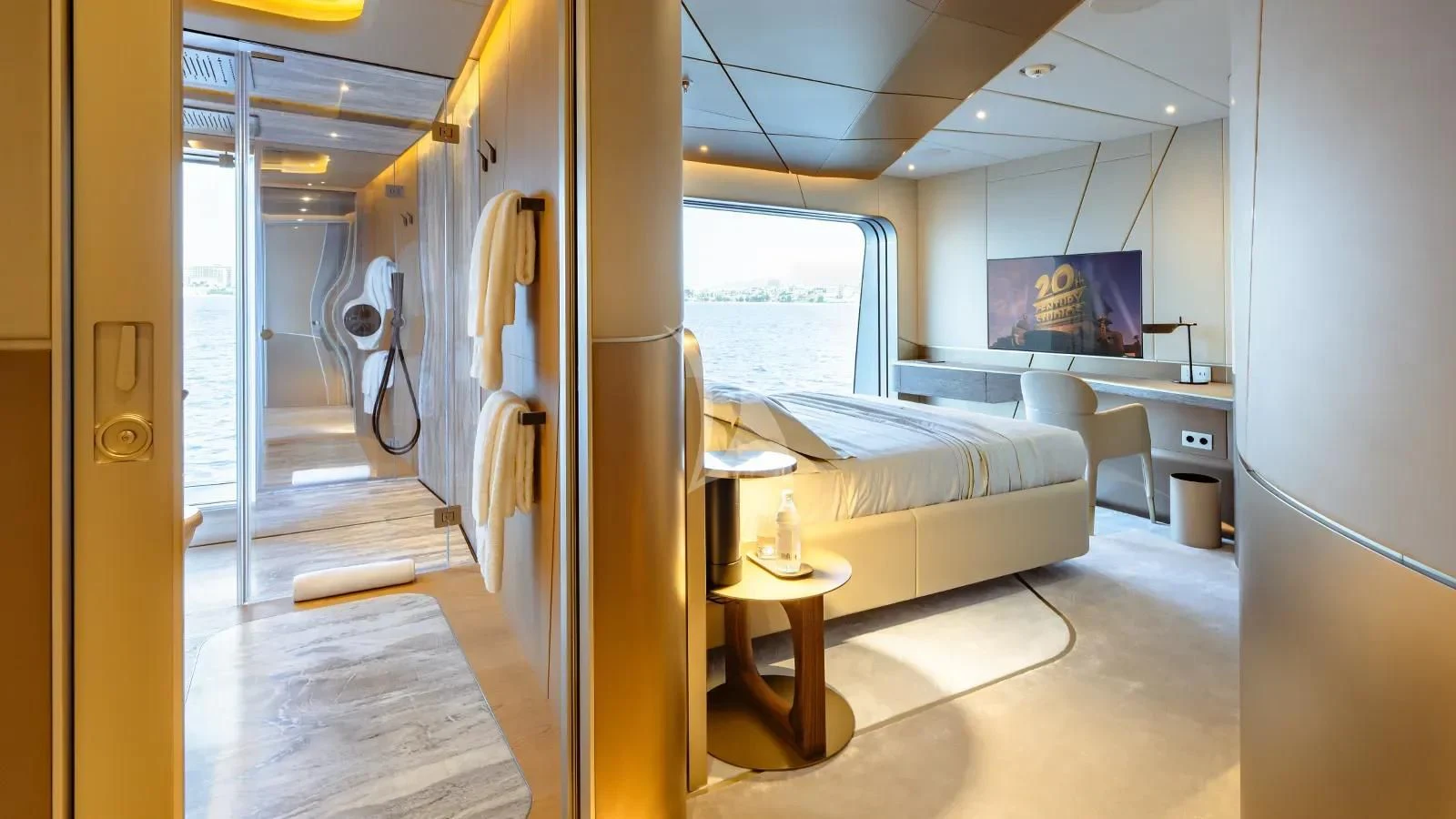 a room with a bed and a table aboard THIS IS IT I Yacht for Sale