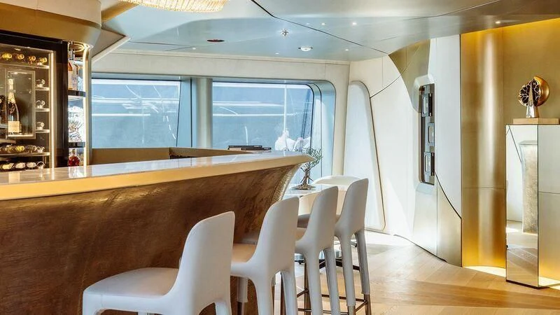 a room with chairs and a table aboard THIS IS IT I Yacht for Sale