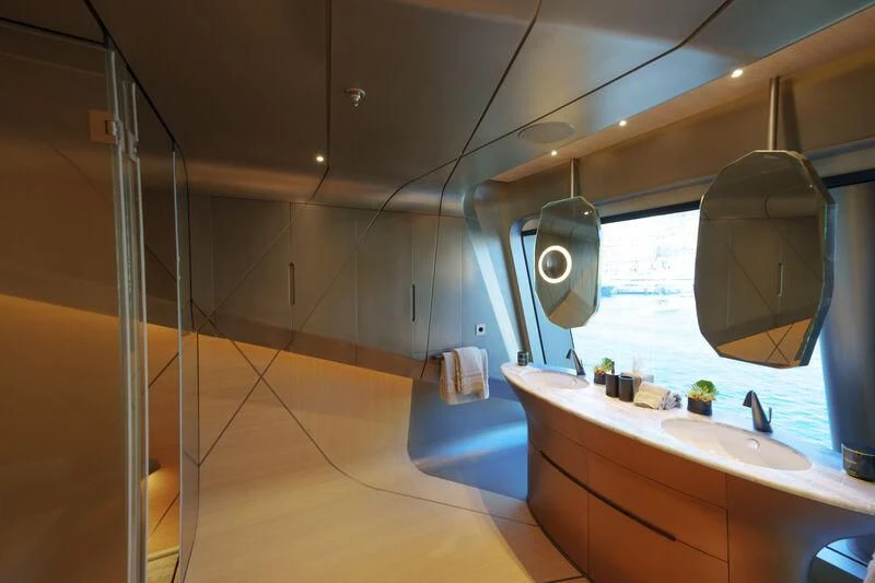 a bathroom with a large mirror aboard THIS IS IT I Yacht for Sale