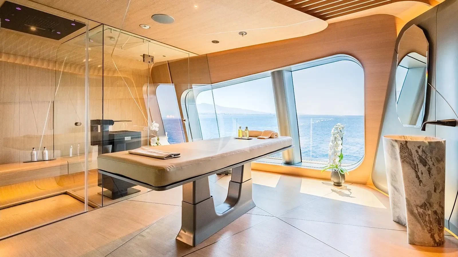 a room with a table and a window aboard THIS IS IT I Yacht for Sale