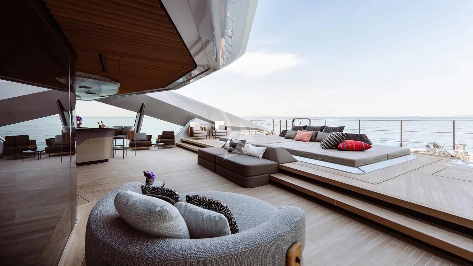 a large room with a bed and a couch aboard THIS IS IT I Yacht for Sale