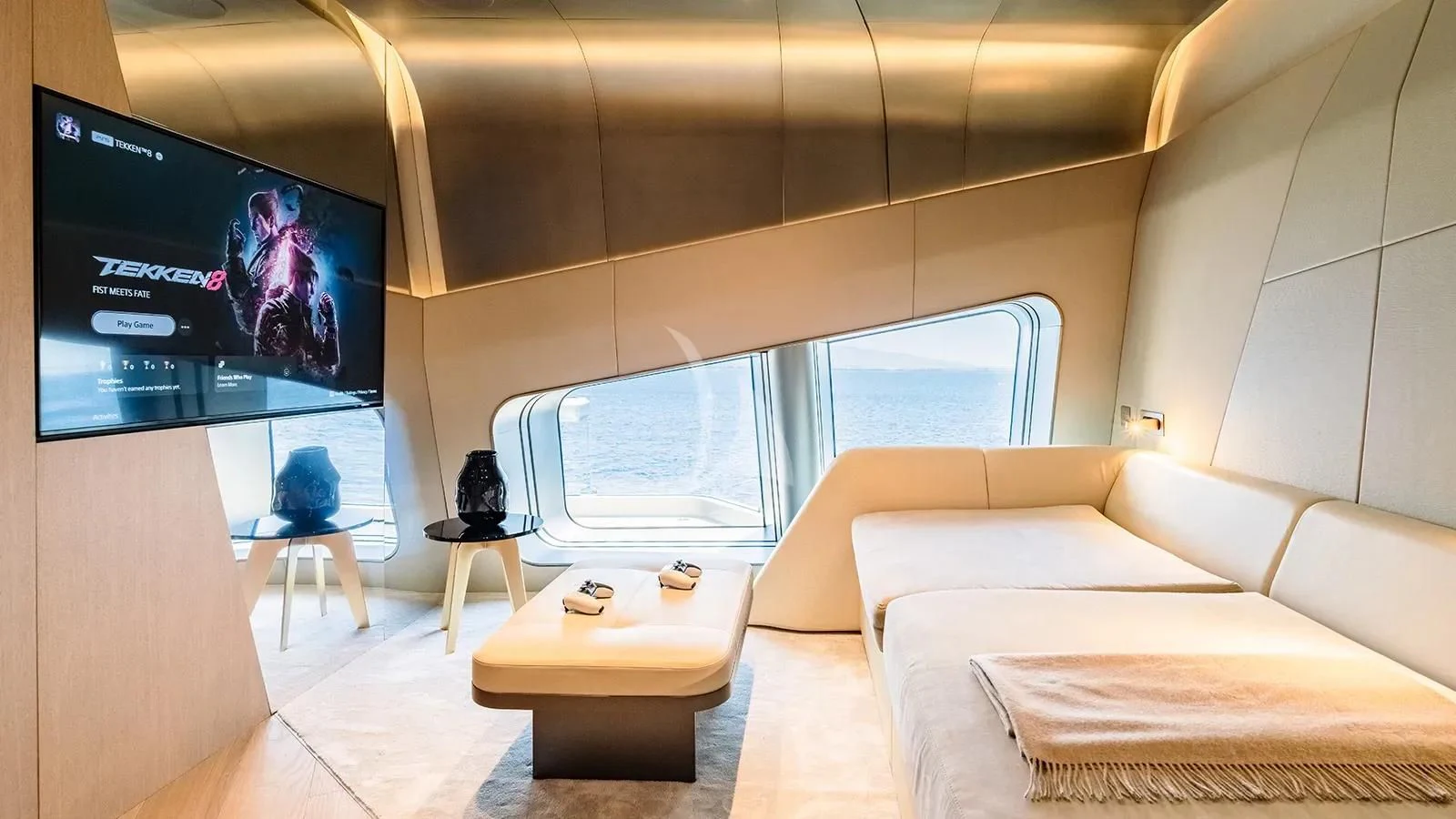 a room with a couch and a tv aboard THIS IS IT I Yacht for Sale