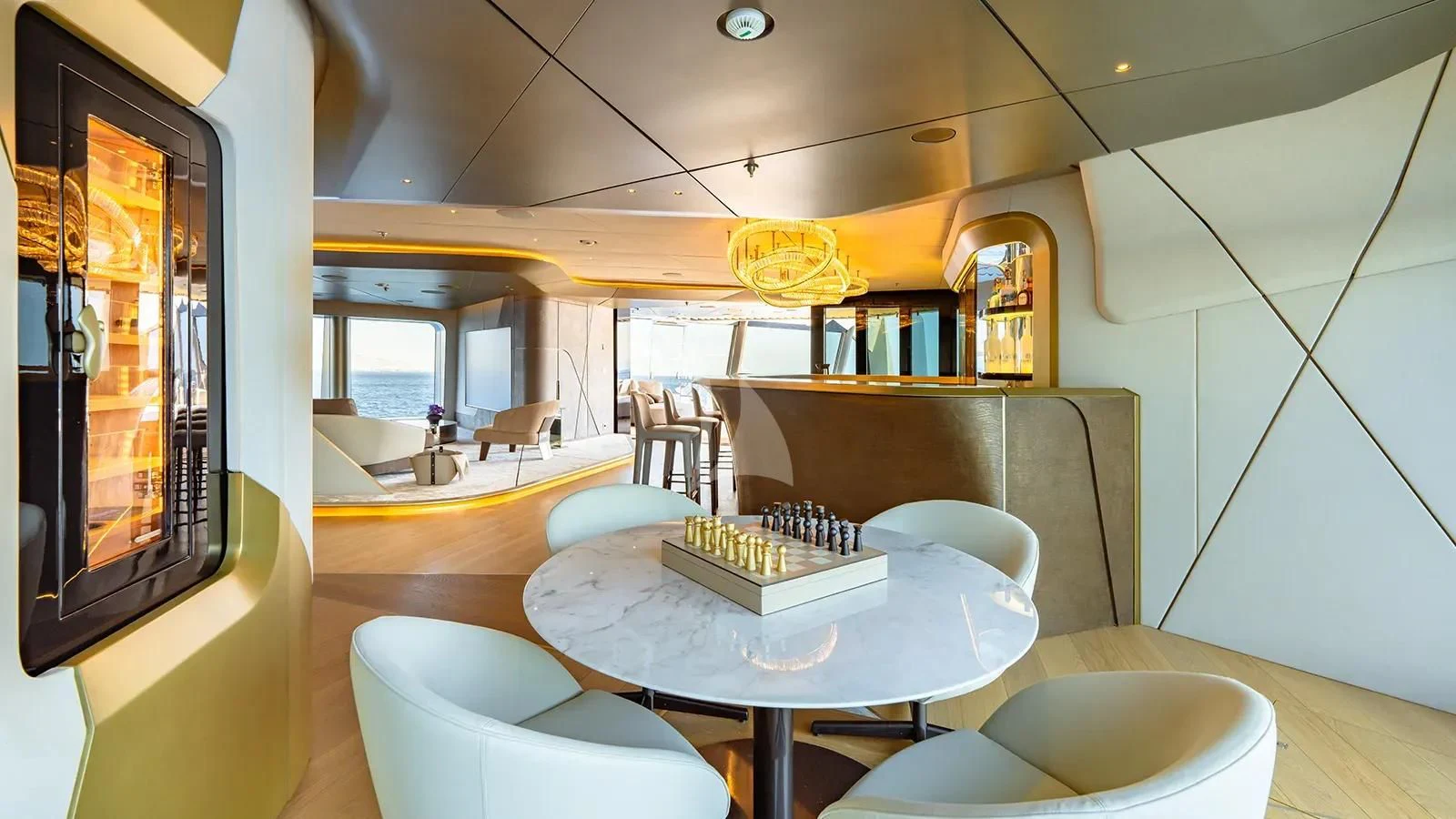 a room with a table and chairs aboard THIS IS IT I Yacht for Sale