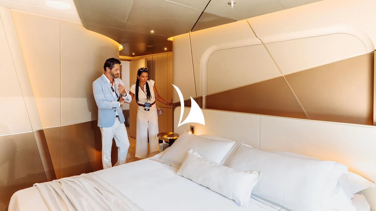 a man and a woman in a hotel room aboard THIS IS IT I Yacht for Sale