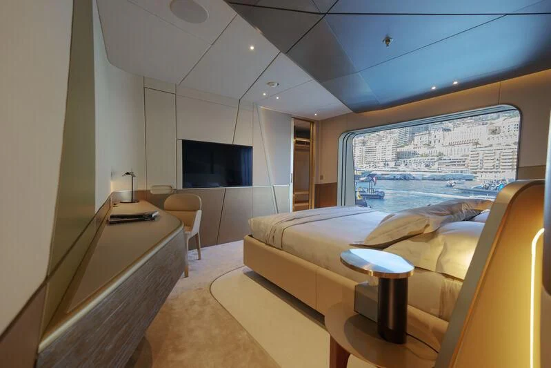 a room with a bed and a tv aboard THIS IS IT I Yacht for Sale