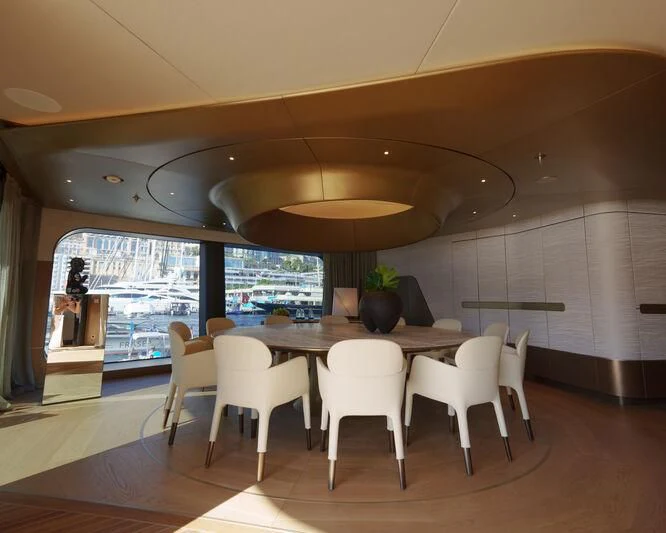 a dining room with a large table aboard THIS IS IT I Yacht for Sale