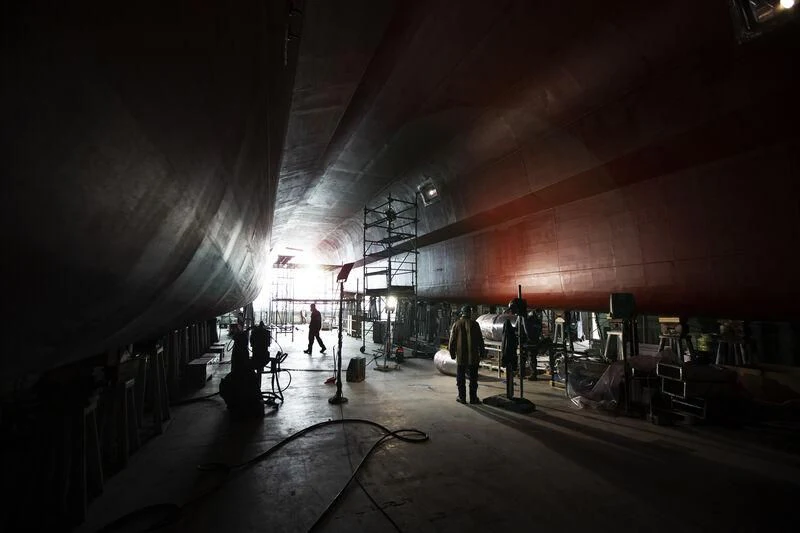 a group of people in a tunnel aboard THIS IS IT I Yacht for Sale