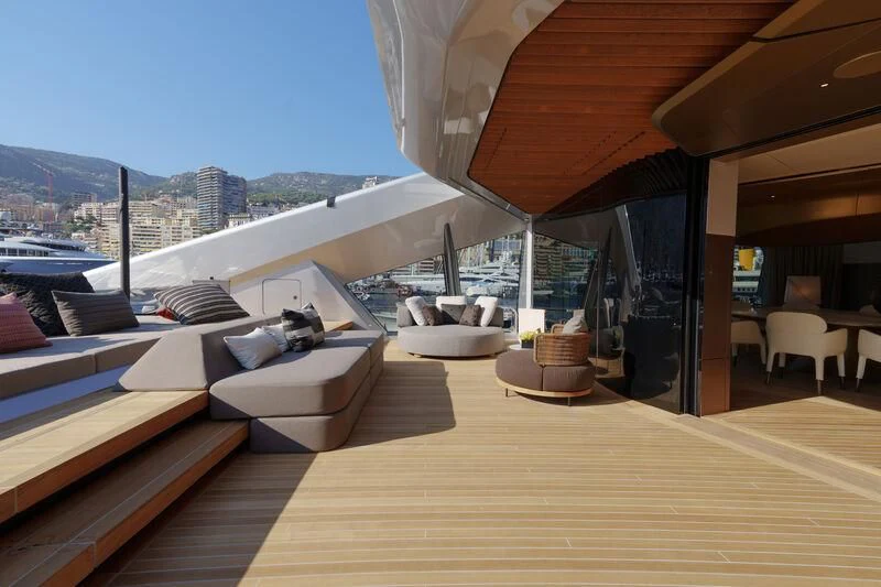 a room with a view of the city and the ocean aboard THIS IS IT I Yacht for Sale