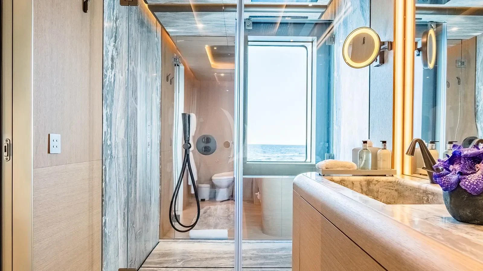 a bathroom with a sink and a mirror aboard THIS IS IT I Yacht for Sale