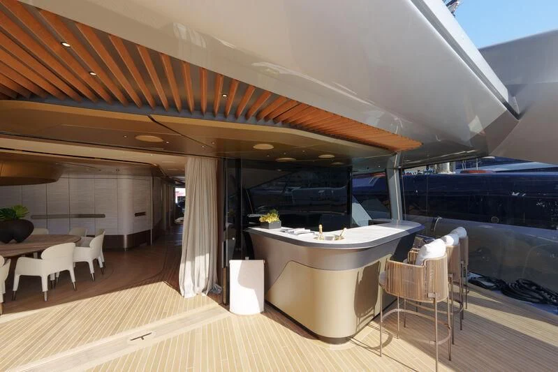 a large room with a table and chairs and a large window aboard THIS IS IT I Yacht for Sale