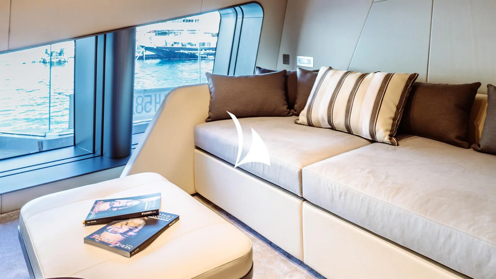 a couch with a coffee table aboard THIS IS IT I Yacht for Sale