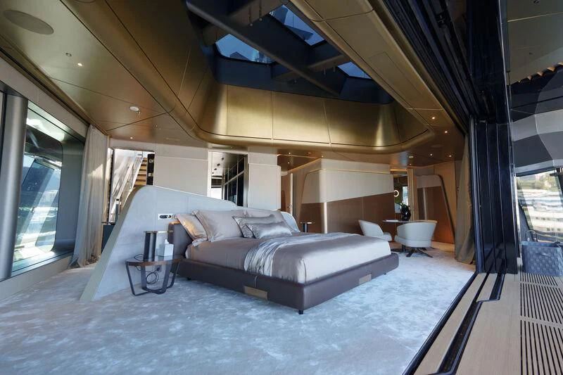 a bedroom with a large bed aboard THIS IS IT I Yacht for Sale