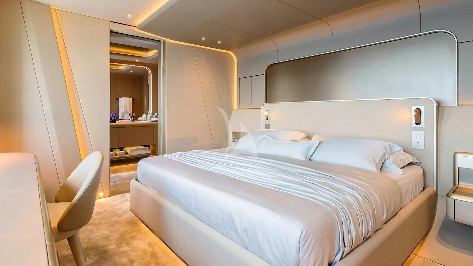 a room with a bed and a chair aboard THIS IS IT I Yacht for Sale
