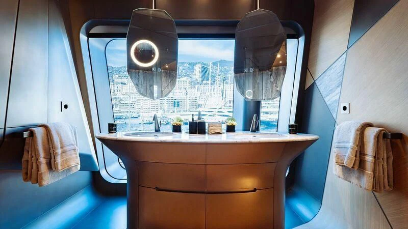a bathroom with a large mirror aboard THIS IS IT I Yacht for Sale