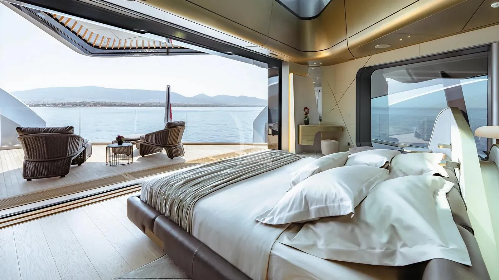 a room with a bed and a chair aboard THIS IS IT I Yacht for Sale