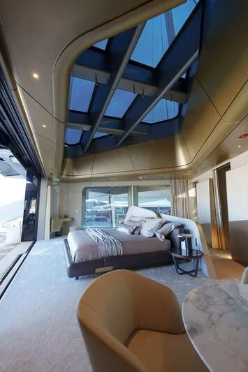 a bedroom with a large bed aboard THIS IS IT I Yacht for Sale